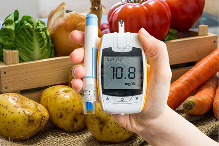 用于测量葡萄糖水平的手持血压计本底蔬菜糖尿病饮食和图片
