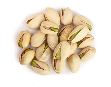 白背景的Pistachios被隔离在顶层图片