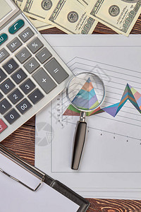 财务和统计概念放大镜图表统计图片
