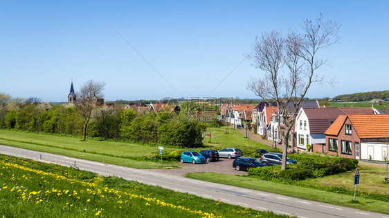 全景村Oudeschild与Martinus教堂和荷兰Wadden岛Texel的长图片