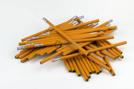 一堆杂乱无章的无缝橙色的六面铅笔图片