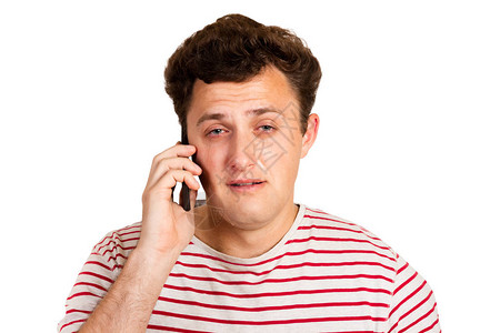 一名年轻人在电话里听到坏消息图片