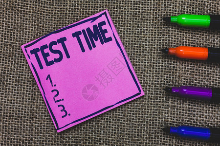 显示测试时间的概念手写商务照片展示考试时刻年级知识课学习紫纸重要提醒图片