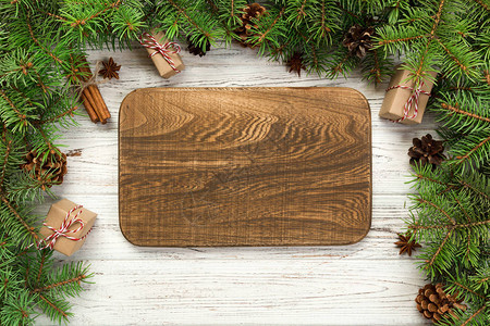 木制圣诞背景上的空木形长方形板图片