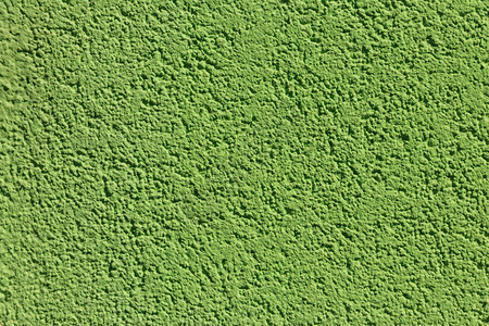 墙上装饰的绿色石膏纹理背景绿色图片