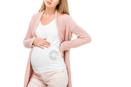 疲惫的孕妇用右手放在腹部与白色隔离的剪影图片