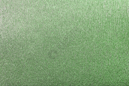 波浪瓦楞纸的绿色箔背景纹理背景图片