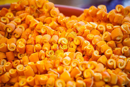 罐头橙皮土耳其市场对面的果实卷子橙皮背景图片