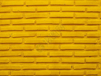 与黄色颜的砖墙背景图片
