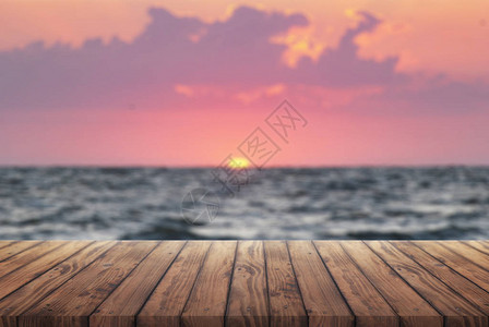 木制复古甲板和日出暑假背景海上日落背景广告旧木图片