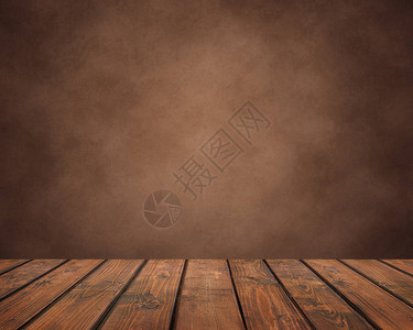 棕色垃圾背景上的木板空木桌背景图片
