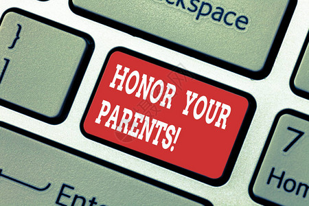写笔记显示尊敬你的父母商业照片展示了对父母老人的高度尊重键盘意图创建计算机消息按图片