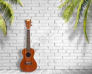 Ukulele白色墙背景的Ukulele吉他旅行和生图片