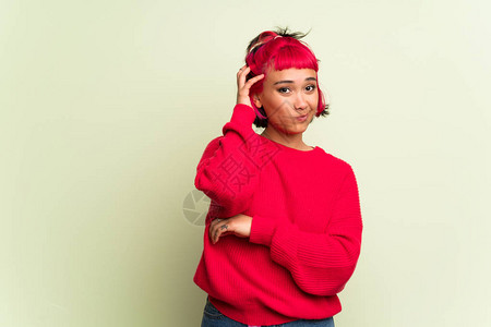 穿着红毛衣的年轻女青年带着沮丧和图片