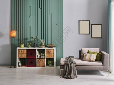 房间内装饰绿色墙椅和书架风格背景图片