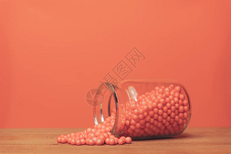 小瓶珊瑚橙制剂背景图片