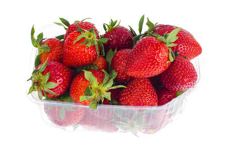 塑料容器中新鲜的红甘蓝草莓背景图片