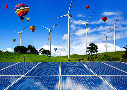 自然景观中的太阳能电池板光伏电池和风力涡轮机农场发电机用于生产可再生绿色能源是友好产业清洁可背景图片