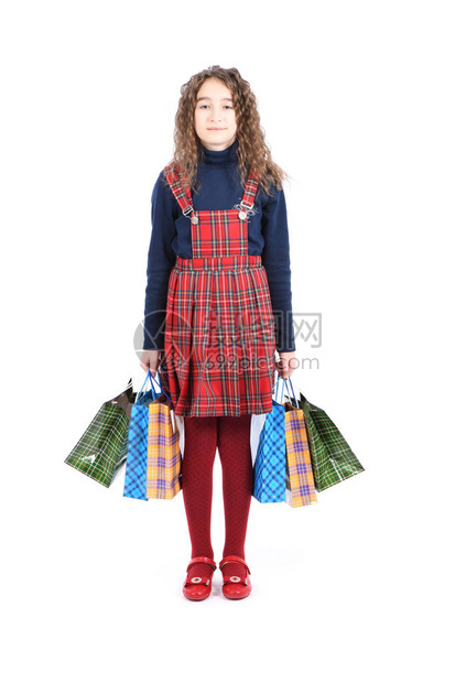 与包装格仔纹理孤立在白色背景上的孩子女孩喜欢在销售季节购物节日礼物图片