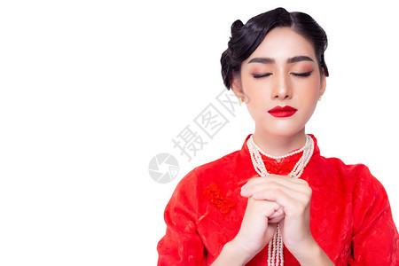 传统美丽的年轻女人许愿女孩在农历新年许愿有魅力的年轻亚洲女人穿服饰图片