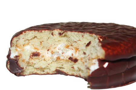 圆形咬巧克力饼干巧克力釉中的美味甜点蛋糕和油酥点心在照片中图片