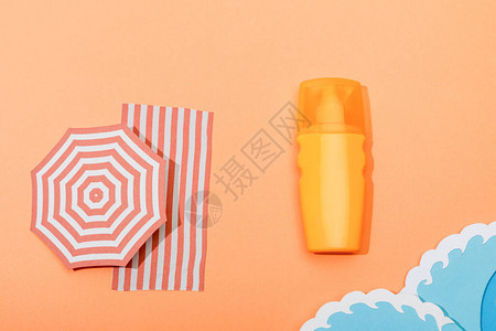 剪纸花纹橙色背景的纸片切割海浪遮晒罩喷洒器防晒背景