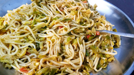 客家山歌Chezwan面条或蔬菜Hakka面条或小面条是印度中背景