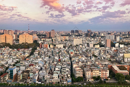 胡志明市城景越南高密度住宅区建筑房屋彼此相近日落时风景最图片