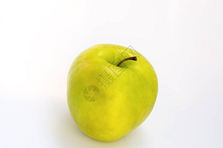 白色背景上的黄绿色苹果图片