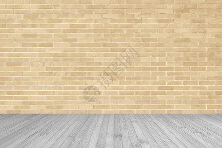 浅黄棕色砖墙灰色木地板图片