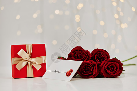 爱心玫瑰花情人节浪漫玫瑰花与礼物盒背景