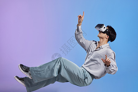 霓虹科技未来感悬浮男性虚拟点击屏幕背景
