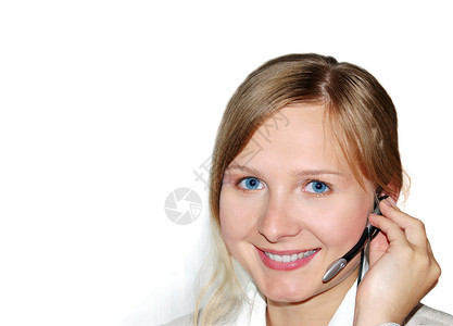美丽的年轻女商人带着耳机图片