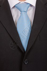 一个商人的细节有蓝色领带的图片