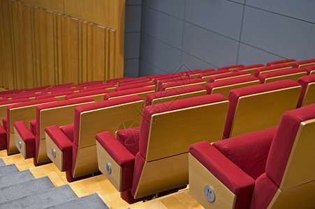 剧院或功能厅的一排座位背景图片