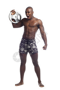 侵略非裔美国摔跤手在白色背景上举图片