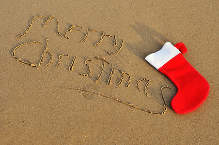 写在沙滩上的句子圣诞快乐还有红白图片