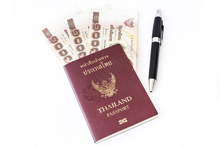 泰国护照和泰国金钱背景图片