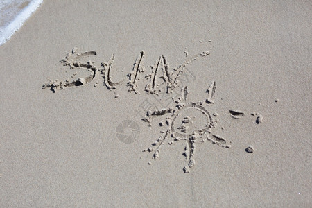沙滩上的太阳字海边图片