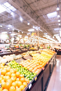 老式模糊抽象有机新鲜生产水果和蔬菜的货架上在德克萨斯州美国模糊的超市杂货店顾客购物bokeh光图片