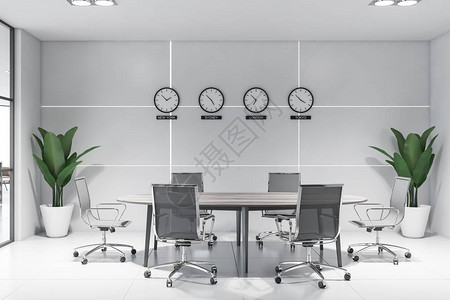 未来派会议室的内部有浅灰色的墙壁瓷砖地板圆形会议桌黑色金属椅子和显示世界时间的时钟图片
