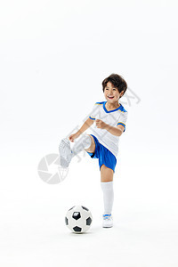 踢足球的活泼小男孩图片