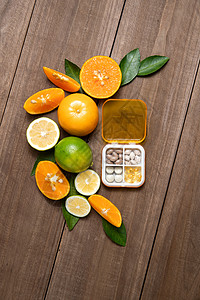 柑桔类水果和药盒高清图片