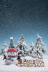 创意北京雪中的圣诞雪人背景