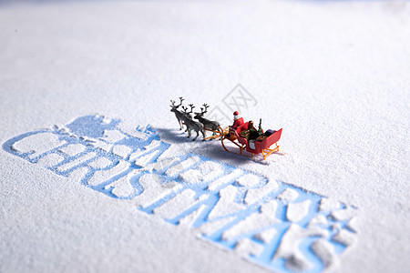 创意北京圣诞节英文和坐雪橇的圣诞老人背景