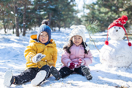 快乐儿童和雪人图片