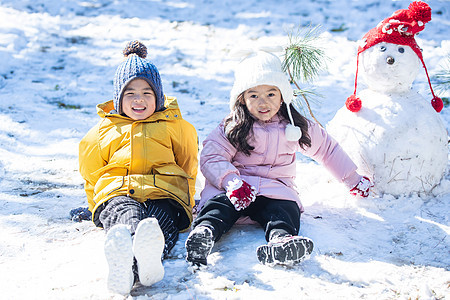 快乐儿童和雪人图片