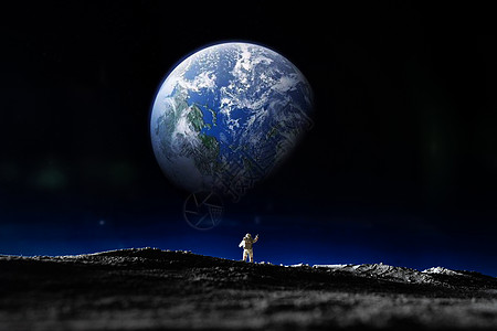 宇航头盔宇航员看向地球背景