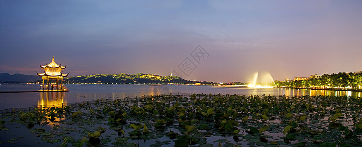 夜晚灯浙江省杭州西湖湖滨夜景背景