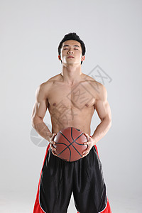 大篮球东方青年男子拿篮球背景